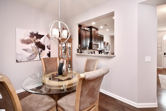 41 Irvington Dr, Greer, SC 29650 - dining room featuring a chandelier, baseboards, dark wood-type flooring, and recessed lighting