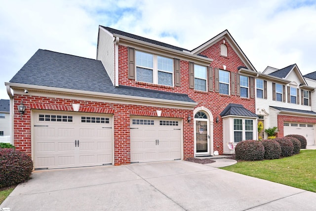 41 Irvington Dr, Greer, SC 29650 - view of front of home featuring concrete driveway, brick siding, and roof with shingles
