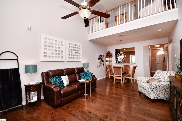 41 Irvington Dr, Greer, SC 29650 - living room featuring a ceiling fan, wood finished floors, baseboards, and a high ceiling