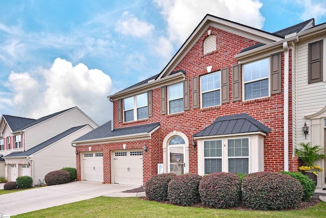 41 Irvington Dr, Greer, SC 29650 - view of front of house with brick siding, driveway, and roof with shingles