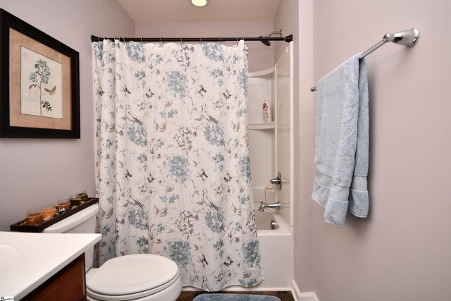 41 Irvington Dr, Greer, SC 29650 - bathroom featuring toilet, vanity, shower / bath combo with shower curtain, and baseboards