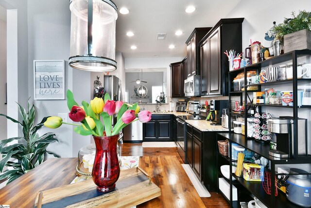41 Irvington Dr, Greer, SC 29650 - kitchen featuring range with electric cooktop, stainless steel microwave, wood finished floors, recessed lighting, and a sink