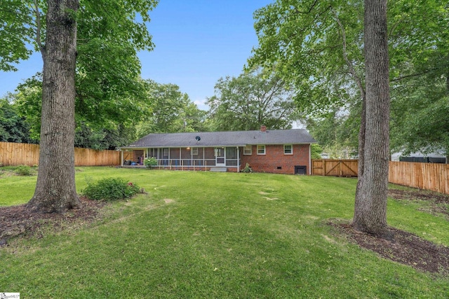 502 Hunts Bridge Rd, Greenville, SC 29617 - back of house featuring a sunroom, brick siding, crawl space, and a chimney