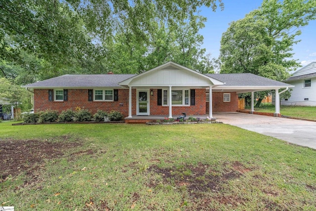 502 Hunts Bridge Rd, Greenville, SC 29617 - single story home featuring brick siding, covered porch, a front yard, and concrete driveway