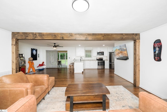 502 Hunts Bridge Rd, Greenville, SC 29617 - living room featuring dark wood finished floors, ceiling fan, ornamental molding, and beam ceiling