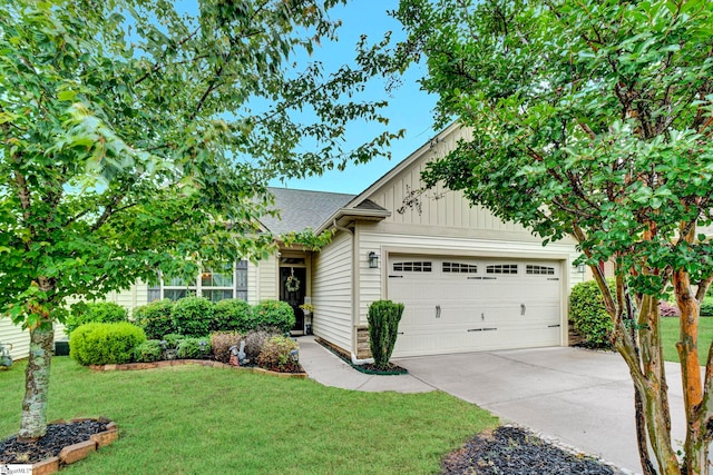 104 Penrith Ct, Simpsonville, SC 29681 - view of front of property featuring an attached garage, concrete driveway, a front yard, and board and batten siding