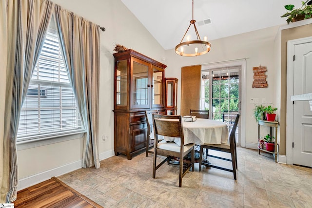 104 Penrith Ct, Simpsonville, SC 29681 - dining space with vaulted ceiling, a chandelier, and baseboards