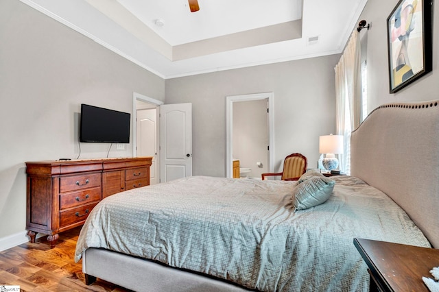 104 Penrith Ct, Simpsonville, SC 29681 - bedroom featuring a raised ceiling, baseboards, ornamental molding, connected bathroom, and a ceiling fan