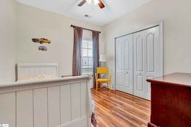 104 Penrith Ct, Simpsonville, SC 29681 - bedroom with light wood-style floors, a closet, and a ceiling fan