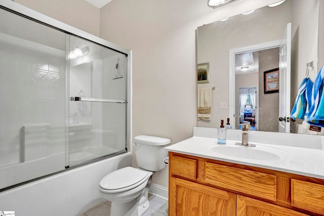 104 Penrith Ct, Simpsonville, SC 29681 - bathroom featuring vanity, toilet, shower / bath combination with glass door, baseboards, and connected bathroom