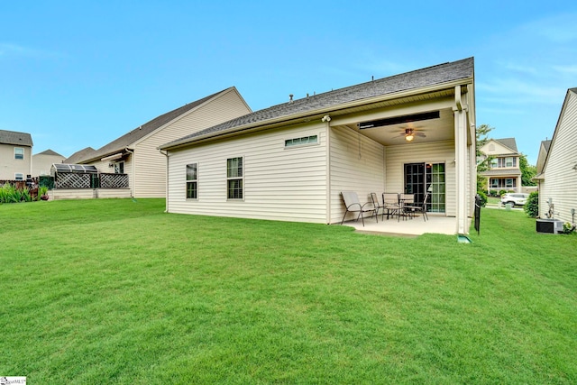 104 Penrith Ct, Simpsonville, SC 29681 - rear view of property with a patio area, a lawn, and central air condition unit