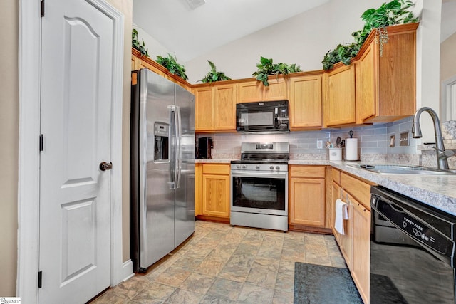 104 Penrith Ct, Simpsonville, SC 29681 - kitchen with black appliances, a sink, vaulted ceiling, tasteful backsplash, and light countertops