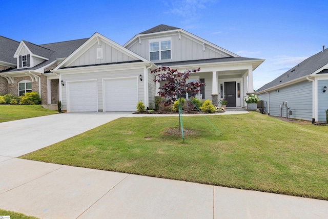 603 Betony Way, Greenville, SC 29607 - craftsman house featuring board and batten siding, a front lawn, concrete driveway, and a porch