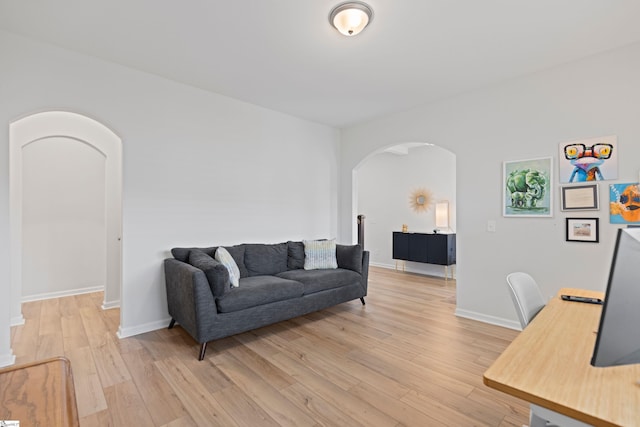 603 Betony Way, Greenville, SC 29607 - living room with arched walkways, light wood-type flooring, and baseboards