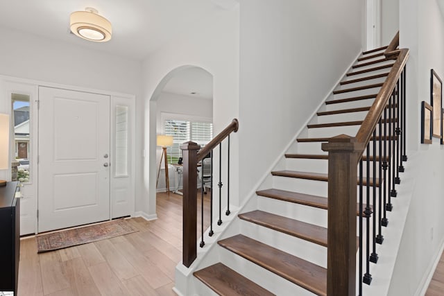 603 Betony Way, Greenville, SC 29607 - entryway featuring light wood-style floors, arched walkways, and stairway