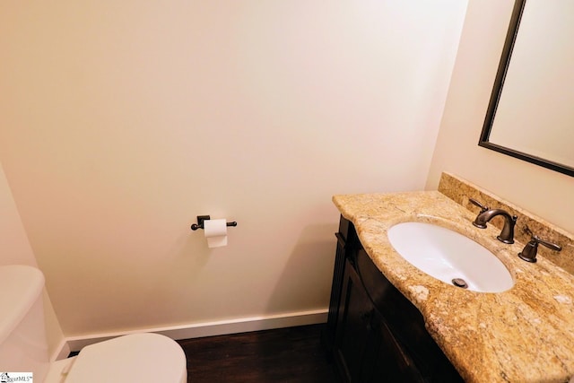208 Catterick Way, Fountain Inn, SC 29644 - bathroom featuring toilet, vanity, baseboards, and wood finished floors