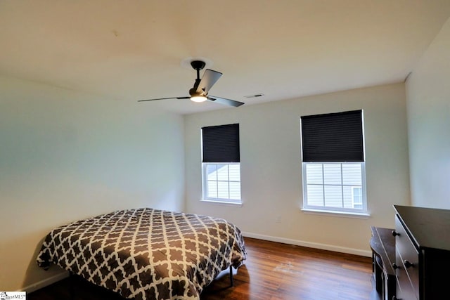 208 Catterick Way, Fountain Inn, SC 29644 - bedroom with multiple windows, baseboards, dark wood-type flooring, and ceiling fan