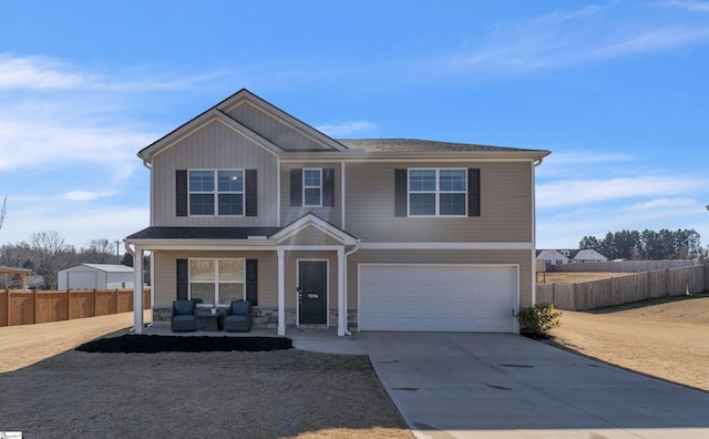 7096 Luna Mae Ct, Boiling Springs, SC 29316 - view of front of property featuring covered porch, a garage, concrete driveway, and stone siding