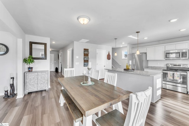 7096 Luna Mae Ct, Boiling Springs, SC 29316 - dining area with light wood-type flooring, recessed lighting, and baseboards