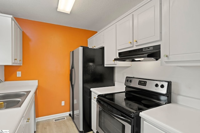147 Highland Ridge Trl, Boiling Springs, SC 29316 - kitchen featuring stainless steel range with electric cooktop, under cabinet range hood, a sink, white cabinets, and light wood finished floors
