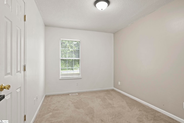 147 Highland Ridge Trl, Boiling Springs, SC 29316 - unfurnished bedroom featuring a textured ceiling, light carpet, and baseboards