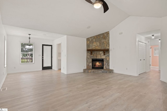 147 Highland Ridge Trl, Boiling Springs, SC 29316 - unfurnished living room featuring ceiling fan, a chandelier, light wood-style floors, vaulted ceiling, and baseboards