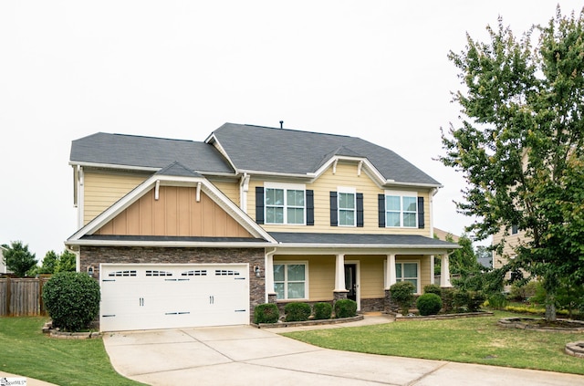 140 Belgian Blue Way, Fountain Inn, SC 29644 - craftsman-style house with concrete driveway, board and batten siding, covered porch, and stone siding