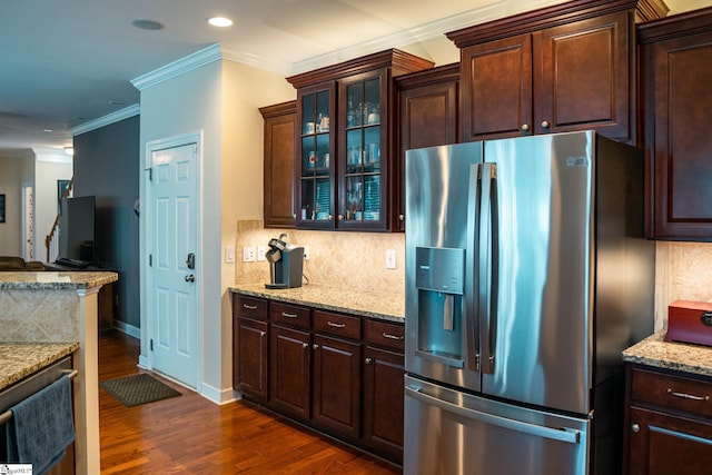 140 Belgian Blue Way, Fountain Inn, SC 29644 - kitchen with stainless steel fridge with ice dispenser, dark wood finished floors, crown molding, dark brown cabinetry, and decorative backsplash