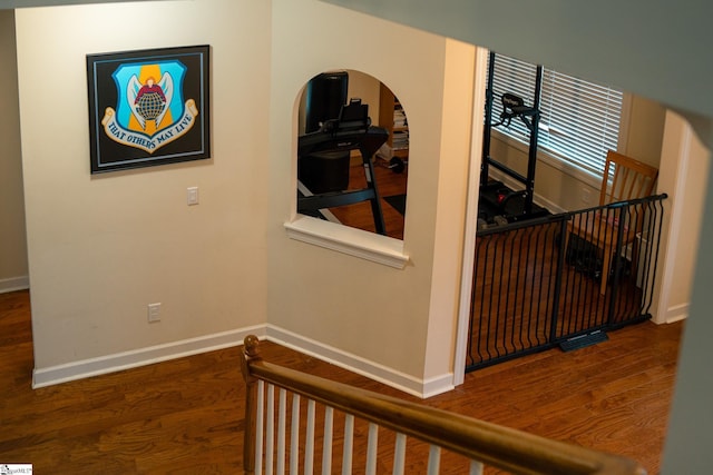 140 Belgian Blue Way, Fountain Inn, SC 29644 - corridor featuring baseboards, wood finished floors, and arched walkways