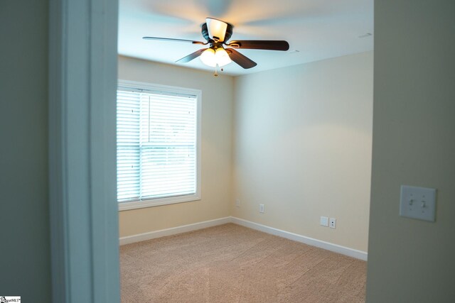 140 Belgian Blue Way, Fountain Inn, SC 29644 - spare room with ceiling fan, healthy amount of natural light, carpet floors, and baseboards