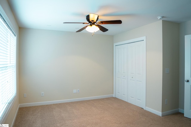 140 Belgian Blue Way, Fountain Inn, SC 29644 - unfurnished bedroom with carpet, a closet, baseboards, and ceiling fan