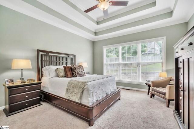 721 Dutchman Ct, Greer, SC 29651 - carpeted bedroom featuring crown molding, baseboards, a tray ceiling, and a ceiling fan