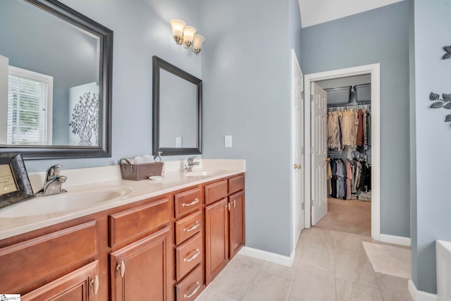 721 Dutchman Ct, Greer, SC 29651 - full bath featuring double vanity, baseboards, and a spacious closet