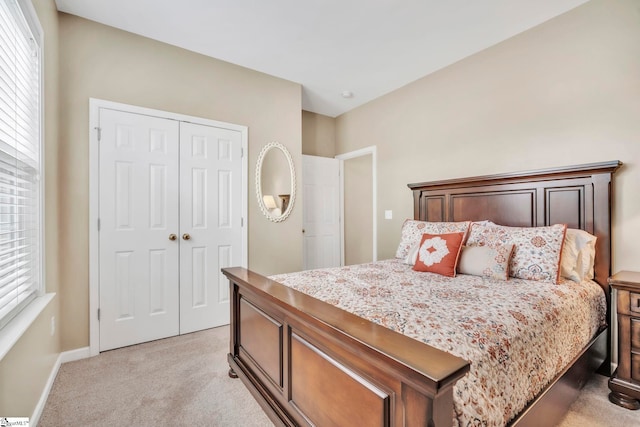721 Dutchman Ct, Greer, SC 29651 - bedroom with light carpet, a closet, and baseboards