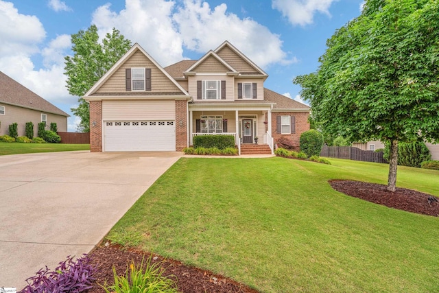 641 Nichole Pl, Greer, SC 29651 - view of front of property with brick siding, driveway, a porch, and an attached garage