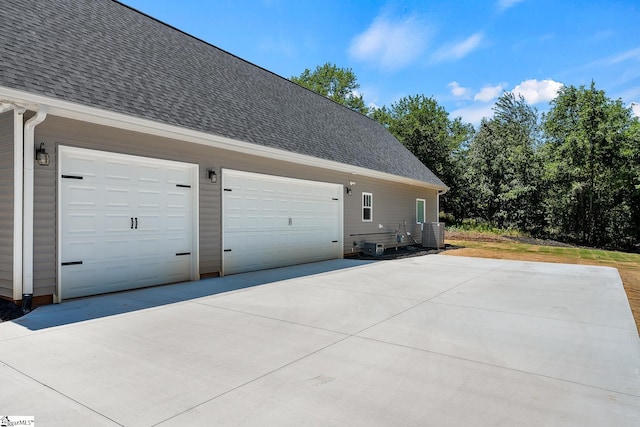 100 Grandview Dr, Anderson, SC 29625 - view of home's exterior with driveway, a garage, central AC, and a shingled roof