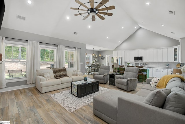 100 Grandview Dr, Anderson, SC 29625 - living room with high vaulted ceiling, a ceiling fan, light wood-style floors, and recessed lighting
