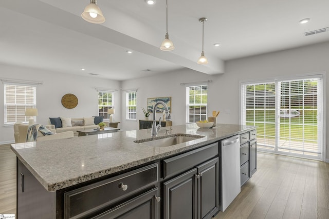 202 Walla Walla Ct, Greenville, SC 29607 - kitchen with a sink, an island with sink, dishwasher, light wood-style flooring, and hanging light fixtures
