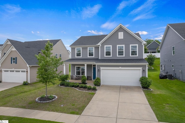 202 Walla Walla Ct, Greenville, SC 29607 - traditional-style home featuring a porch, an attached garage, concrete driveway, and a front yard