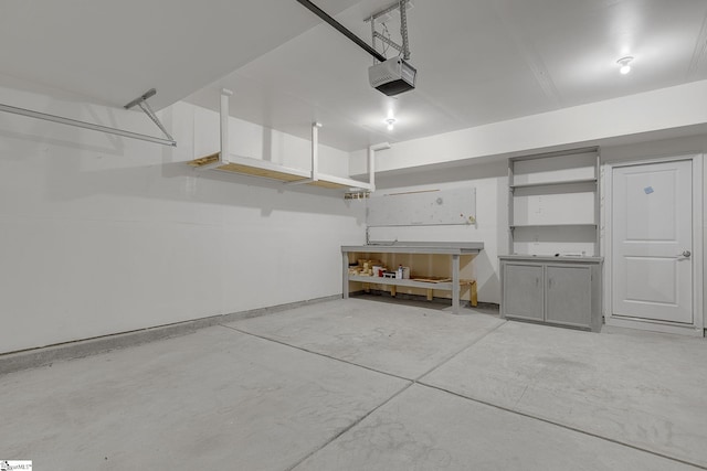 202 Walla Walla Ct, Greenville, SC 29607 - garage featuring a workshop area and a garage door opener