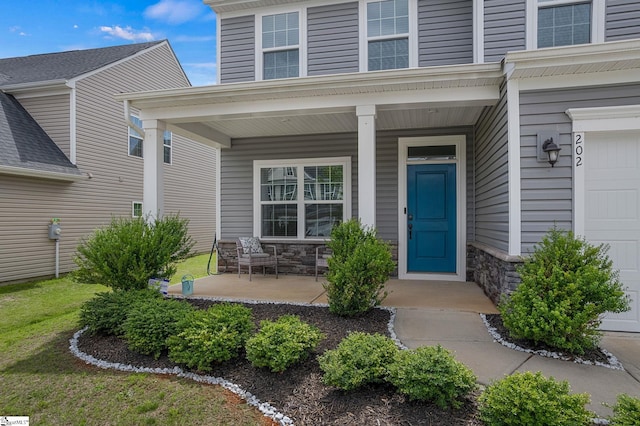 202 Walla Walla Ct, Greenville, SC 29607 - view of exterior entry featuring a porch and stone siding