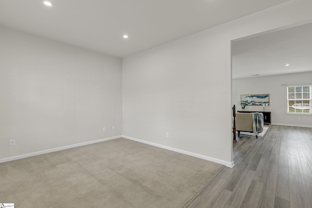 202 Walla Walla Ct, Greenville, SC 29607 - spare room featuring recessed lighting, baseboards, and wood finished floors