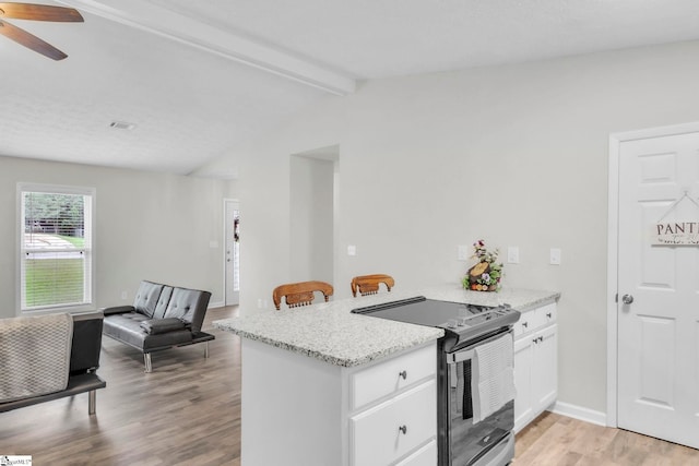 113 Sedgefield Ct, Anderson, SC 29621 - kitchen featuring range with electric cooktop, light wood-style floors, a ceiling fan, a peninsula, and white cabinetry