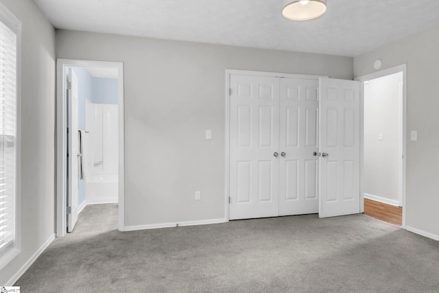 113 Sedgefield Ct, Anderson, SC 29621 - unfurnished bedroom with carpet flooring, a closet, baseboards, and ensuite bath