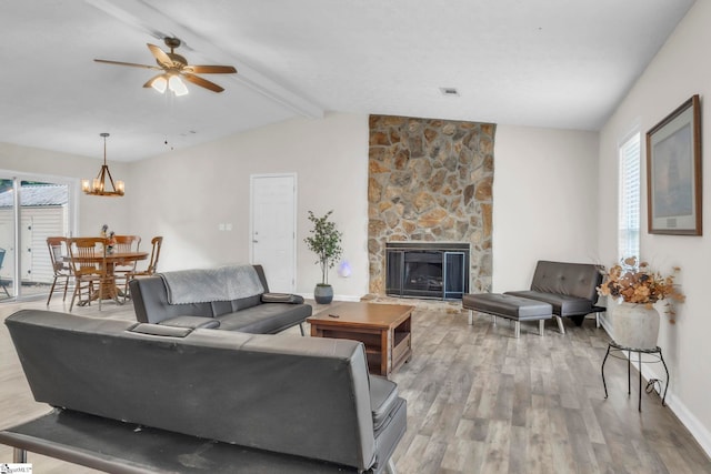 113 Sedgefield Ct, Anderson, SC 29621 - living room featuring light wood-style floors, ceiling fan, a fireplace, a chandelier, and baseboards