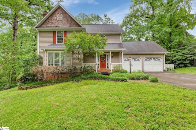 304 Oak Brook Way, Taylors, SC 29687 - traditional-style home with a chimney, an attached garage, asphalt driveway, a porch, and a front lawn