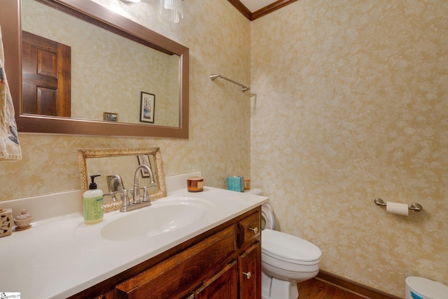 304 Oak Brook Way, Taylors, SC 29687 - bathroom with toilet, vanity, wood finished floors, and wallpapered walls