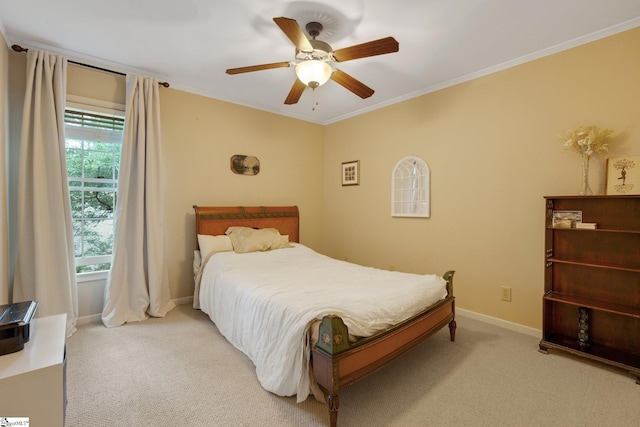 304 Oak Brook Way, Taylors, SC 29687 - bedroom with light colored carpet, baseboards, ornamental molding, and a ceiling fan