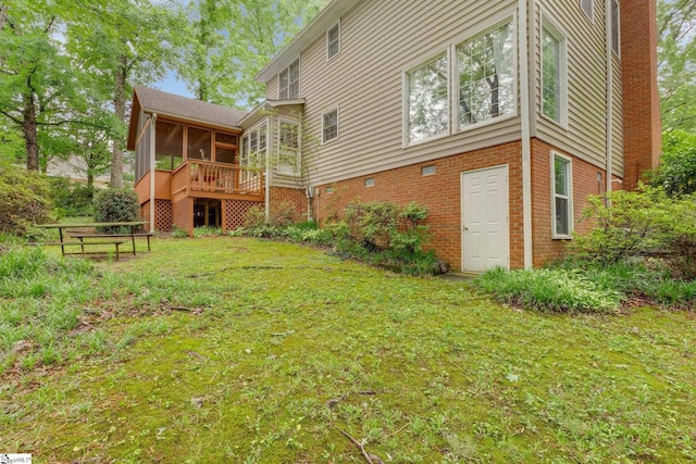 304 Oak Brook Way, Taylors, SC 29687 - rear view of property featuring a sunroom, a lawn, and brick siding