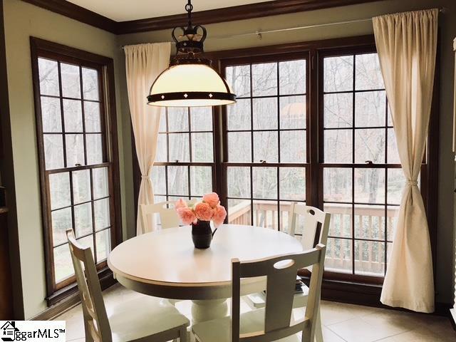 304 Oak Brook Way, Taylors, SC 29687 - dining space with light tile patterned floors